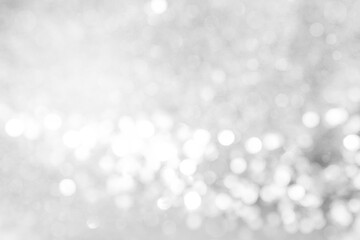Abstract blurred light bokeh on grey background, festive season concept background
