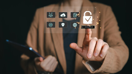 Businesswoman touching virtual padlock for enterprise cloud defense. Corporate cyber security and cloud computing protection. Data safety and network infrastructure concept.