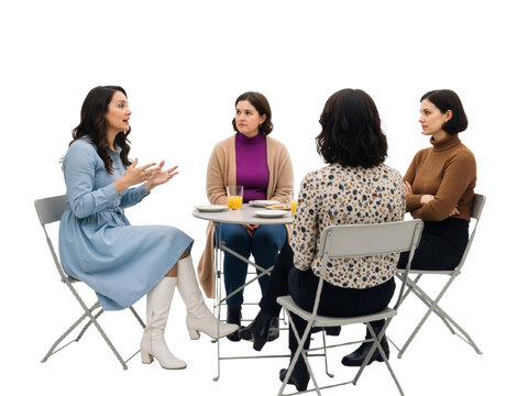 Four Women in Conversation &ndash; A Moment of Connection and Camaraderie at a Round Table

