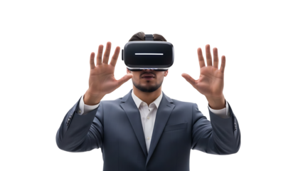 Man wearing a virtual reality headset, experiencing an immersive digital world. He is standing with both hands out in front of him, as if interacting with something in the virtual space. 