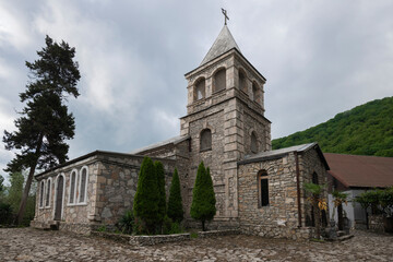 Church of St. John Chrysostom on a cloudy May morning. Kaman Monastery, Abkhazia