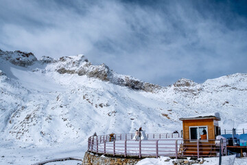 Snowy Pavilion by the Mountain Lake