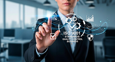 A businesswoman interacting with an ISO 9001 interface for quality and management.