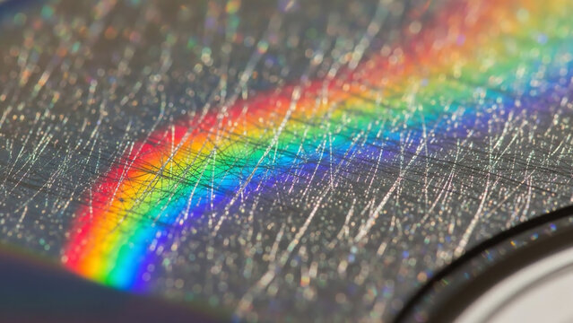 Rainbow Reflection on a Scratched Compact Disc Surface with Detailed Texture