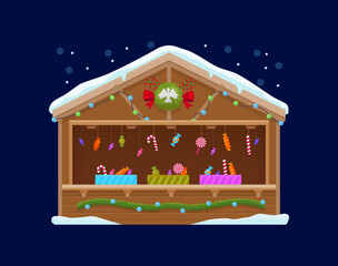Obraz premium Christmas holiday market booth or winter street bazaar kiosk with candy canes, cartoon vector. Christmas market shop booth or store kiosk and wooden stall with sweet desserts, candies and confection