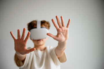teenager playing with virtual reality glasses