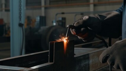 A welder at work, sparks flying, illustrating a skilled trade in action Stock Video
