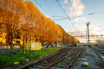 Railway tracks at sunset in industrial port area Altrheinweg. Basel, Canton of Basel-Stadt, Switzerland.