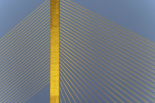 The illuminated Rama VIII Bridge, a cable-stayed bridge across Mae Nam Chao Praya, Bangkok, Thailand