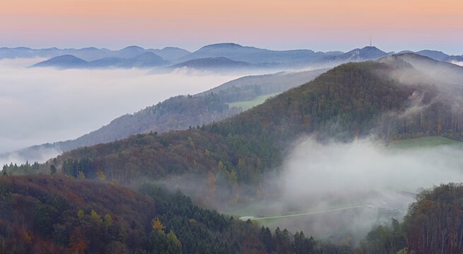 View from the Gisliflue of the Jurassic foothills covered in fog, Wasserfluh, in the light of dawn, Talheim, Canton, Aargau, Switzerland