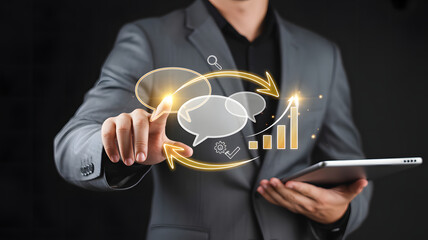 Businessperson Using Tablet with Glowing Interface and Data Icons
