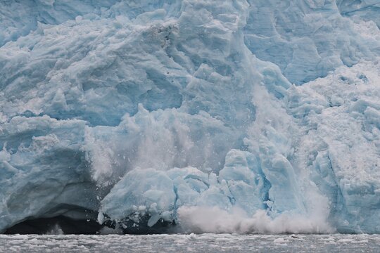 Calving glacier, edge of Monacobreen, Liefdefjord, Woodfjord area, Spitsbergen Island, Svalbard and Jan Mayen archipelago, Norway