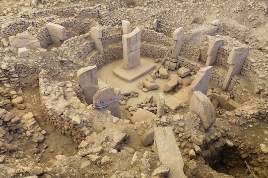 Gobekli Tepe neolithic archaeological site dating from 10 millennium BC, Large circular structures with massive stone pillars, Potbelly Hill, Sanliurfa, Turkey