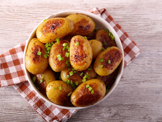 Spicy roast potatoes served
