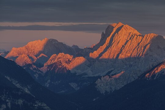 Distant view of steep mountains in the evening light, clouds, autumn, view from Wank to Karwendel Mountains, Werdenfelser Land, Upper Bavaria, Bavaria, Germany