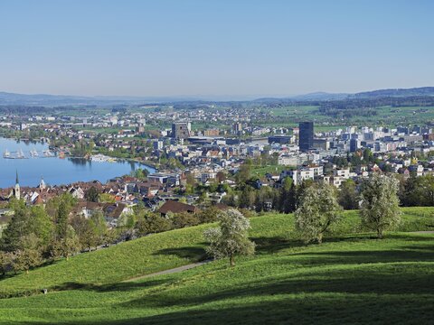View of Lake Zug and the city with the skyscrapers Parktower and Uptown, Zug, Canton Zug, Switzerland