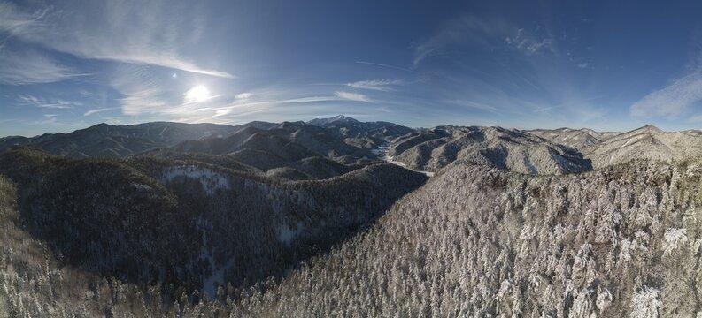 Aerial view of the Schneeberg over the snow-covered landscape near the chapel of the seven holy fathers, Mariahilfberg, Gutenstein, Lower Austria, Austria