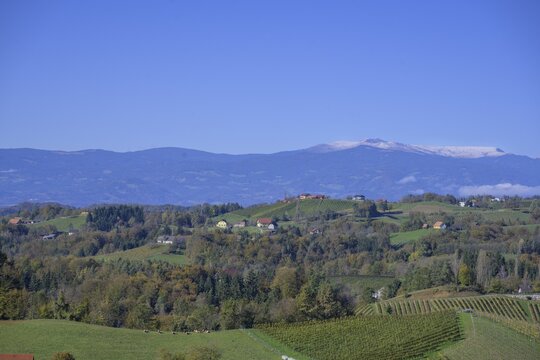 View as far as the snow-covered Koralpe, Leutschach an der Weinstra&szlig;e, Styria, Austria