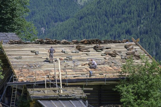 Old farmhouse gets a new shingle roof, Ulten, South Tyrol, Italy