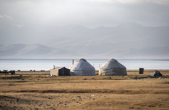 Yurts at Song Kul mountain lake in autumn, Moldo Too mountains, Naryn region, Kyrgyzstan