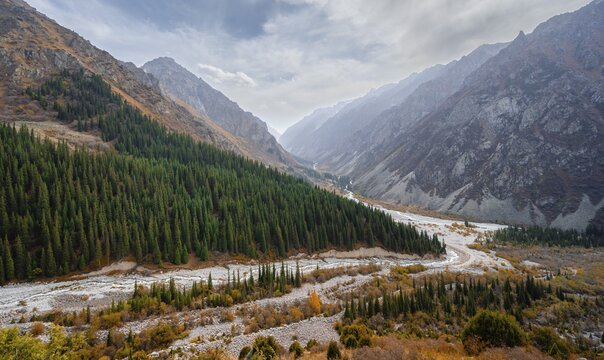 View into the Ala Archa valley from the viewpoint at broken heart rock, autumnal mountain landscape, mountain stream Ak Say and Ala Archa, Ala Archa National Park, Khirgiz Ala-Too Mountains, Chuy Region, Kyrgyzstan