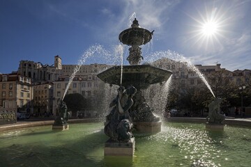 Fountain, bronze fountain, backlight, Rossio Square, Lisbon, Portugal