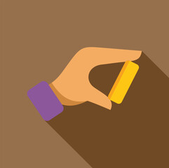 Hand holding a small gold bar, representing investment, savings, and financial security