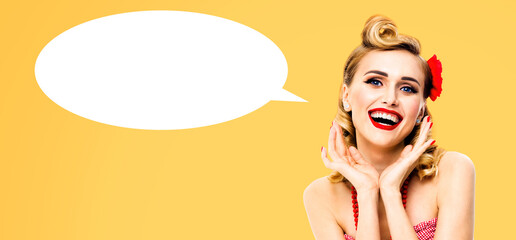 Expressive surprised, happy cute woman. Astonished pinup girl with wide open mouth, eyes, raises hands. Retro vintage ad concept. Isolated yellow background with white mockup empty speech bubble
