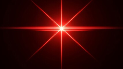Bright red starburst lens flare on dark background