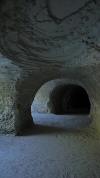 Flickering light inside a tunnel in the Tiza mine cave in Tlaxcala state of Mexico Dolly shot
