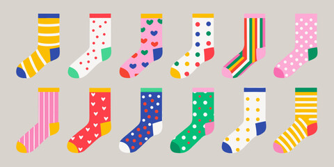 Colorful assorted socks with various patterns displayed on a light gray background