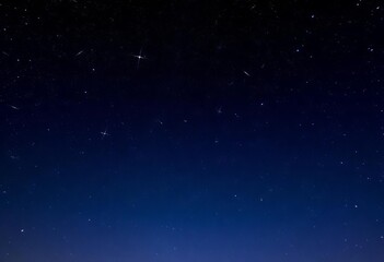 Fototapeta premium Distant, countless stars fill a dark, inky sky, celestial bodies, asteroids