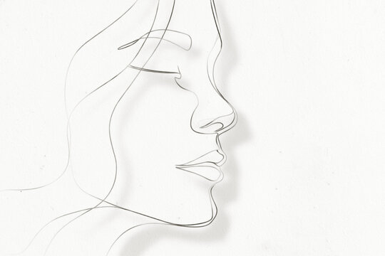 line drawing of a woman's profile in a continuous stroke, calm and contemplative, minimal art portrait with a downward gaze, suitable for beauty, wellness, and fashion branding - Powered by Adobe