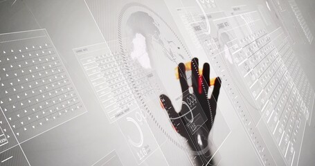 Pressing gloved right hand engaging pale HUD in lab, with colored fingertip sensors and UI panels