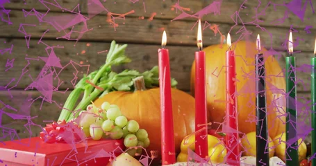 Fotobehang Vlees Displaying centered autumnal centerpiece on wood table with lit taper candles, pumpkin, red gift  © vectorfusionart