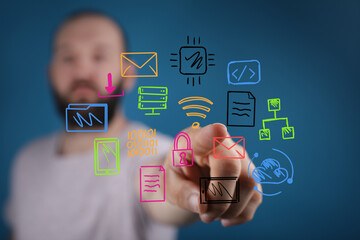 High-quality stock photo depicting a man interacting with digital icons representing technology, data, and connectivity.