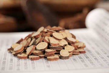 Traditional Chinese Herbal Medicine Licorice Root Slices on Prescription Paper Shows Natural Health Benefits
