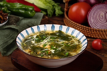 Traditional Chinese Pork and Wakame Soup with Fresh Vegetables