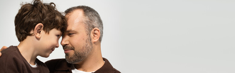 Heartwarming moments between a father and his young son in a cozy setting