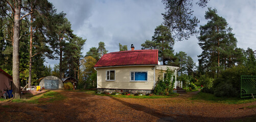 Russia, Karelia. A well-maintained garden house on the shore of Lake Ladoga near the town of Sortavala.