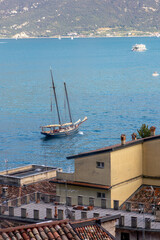 Panoramic aerial view of Lake Garda from the rooftops of Limone sul Garda, Italy.
