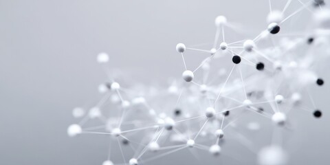 Abstract molecular network with black and white spheres on grey background