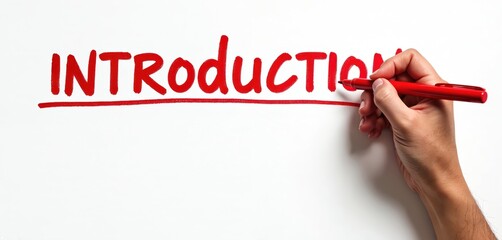 Human hand writes introduction word with red marker on white paper. Presentation starts with intro, new topic launch with preamble. First impression important concept. Project begins from