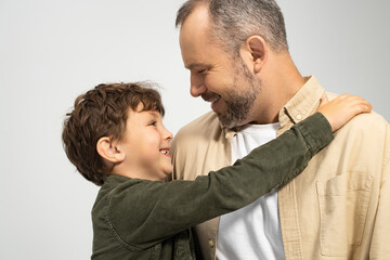 Cherished moments shared between father and son filled with laughter and smiles