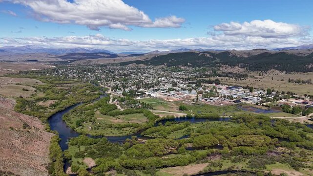 Aerial view of the City of "Junin de los Andes", Neuquen, Argentina.Aerial view of the City of "Junin de los Andes", Neuquen, Argentina. Close-up of the Chimehuin River