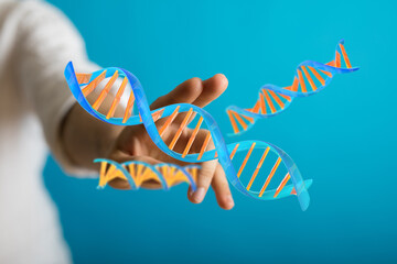 Abstract photo of hand touching a DNA strand. Concept for genetic research, biology, medical science, healthca