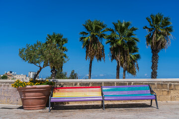 Colourful benches in Bari in Puglia in Italy