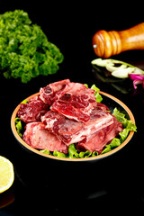 Fresh Raw Beef Ribs and Inner Cuts on Golden Plate