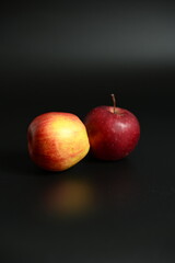 High-contrast studio shot highlighting the vibrant colors and smooth peel of the fruit. Perfect for themes of healthy diet and clean food advertising.