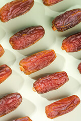 Golden Dried Dates Fruit Pattern on White Background - Healthy Natural Sweet Snack Food Photography